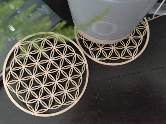 Bloom – Holzuntersetzer mit der Blume des Lebens