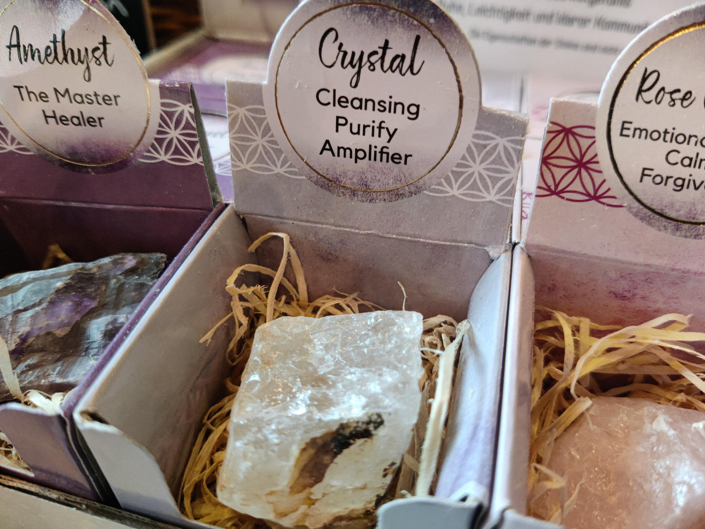 Heilsteine in kleiner Box - Amethyst, Bergkristall, Rosenquarz und Aquamarin