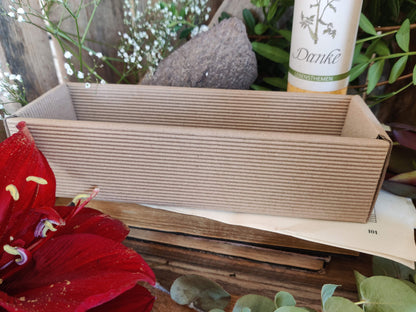 Geschenkboxen für die Allgäuer Heilkräuter Kerzen